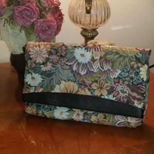 Tapestry clutch